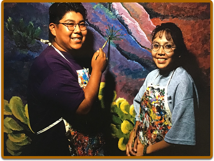 students painting mural