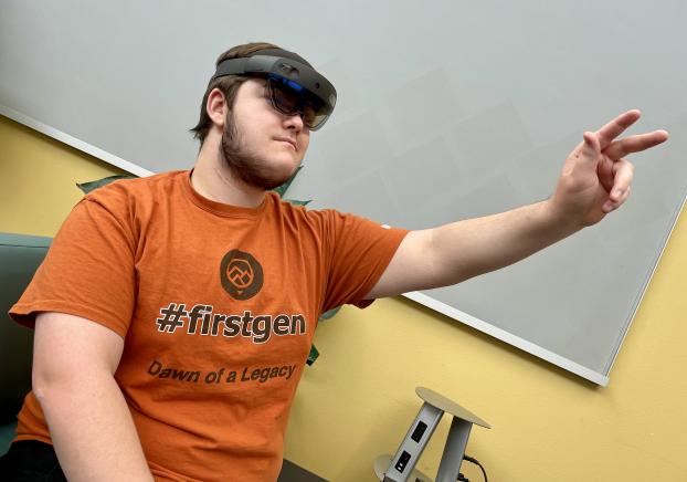 Student Worker Prepares the HoloLens 2